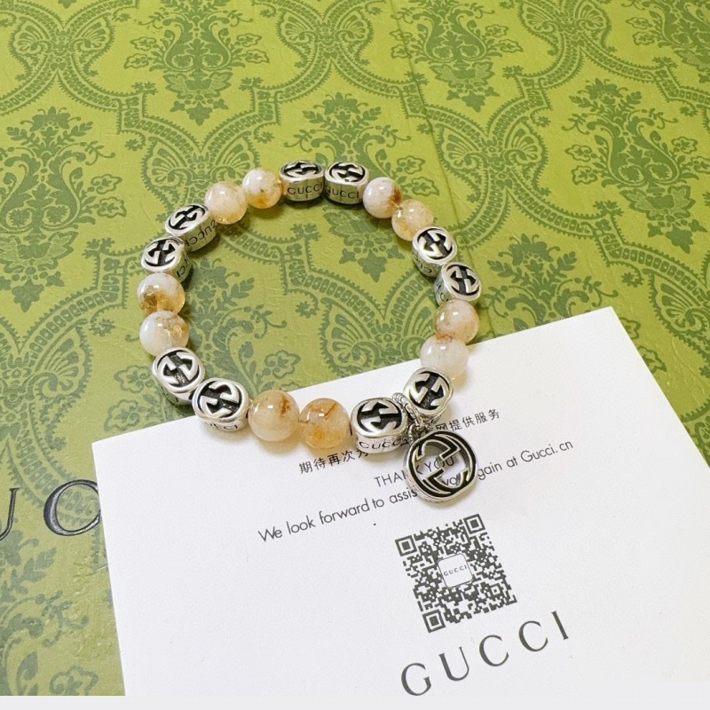 G*u*i bracelets